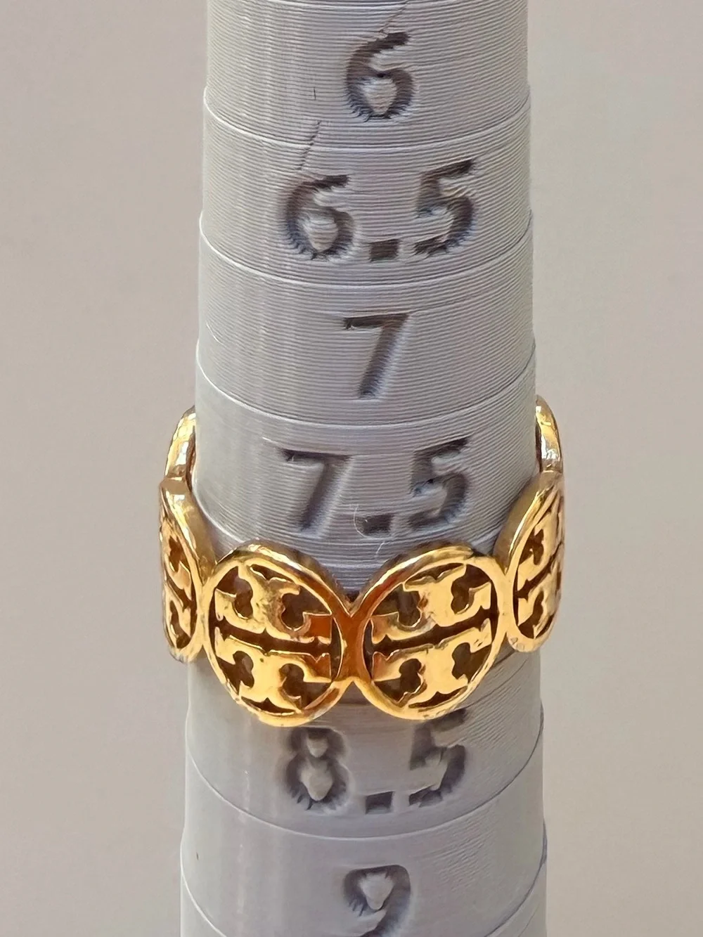 Tory Burch Gold Tone Logo Openwork Band Ring, Size 8